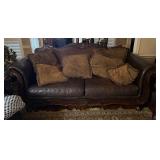  Ashley  Carved Italian brown leather/fabric couch