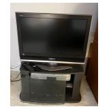 PPM029 Panasonic 26” TV, Panasonic VHS/DVD Player , Cisco Cable Box & Media Stand