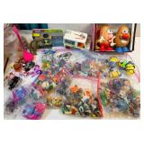 FHM205 - Huge Mixed Toy Lot: Mr & Mrs Potato Head, Minions, Dinosaur, Figures & Bagged Toys