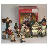 FHM256 - Assorted Décor Lot – Santa’s Workbench Lighted House, Hallmark Santa, Ornaments & More