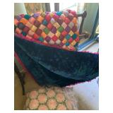 Antique quilt rack and Antique satin quilt