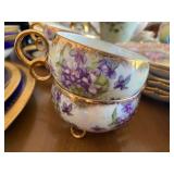 Hand painted footed cups or bowls with gold trim
