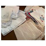 Collection of vintage and antique handkerchiefs and hed scarves