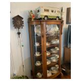 Oak China Cabinet filled with Crown potteries, 8 pc place setting, made in USA