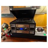 All in one stereo, turntable, cd, cassette and radio by Crosley