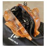 Timmy Woods Beverly Hills elephant-shaped hand-carved wooden handbag.