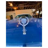 1973 Cadillac Eldorado convertible with white leather interior.