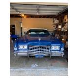 1973 Cadillac Eldorado convertible with white leather interior.