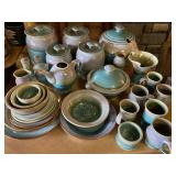 place settings , mugs, soup tureen, canister set, bowls, platters, and accessories