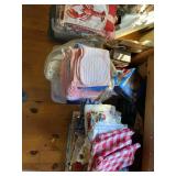 bins of linens inc many matching sets of towels not shown