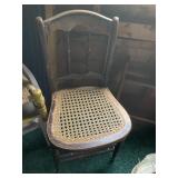 pair of older by undamaged caned chairs