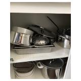 many excellent condition pans and pots