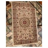 one of many small machine made rugs