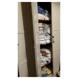 one of several stashes of sheets, towels, and bedding
