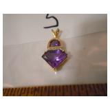 Gold and amythist pendant