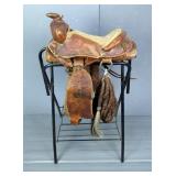 Western Leather Saddle, Leather Quirt, And Horse Mane Macate Western Leather Saddle, Leather Quirt, And Horse Mane Macate