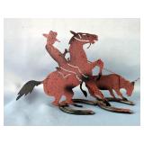 Metal Cowboy And Steer Sculpture On Horseshoe Base Metal Cowboy And Steer Sculpture On Horseshoe Base