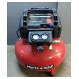 Porter Cable 6 Gal Portable Air Compressor, Model C2002, Includes Hose and Tire Inflator, Powers On 