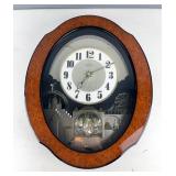 Small World Rhythm Wall Clock, Powers On 