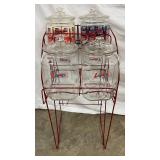 Vintage Lance Four-Jar Rack with Embossed Glass Lids and Red Metal Stand