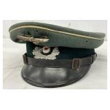 German WWII Officer’s Visor Hat with Eagle Insignia German WWII Officer’s Visor Hat with Eagle Insignia