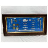 Framed Set of 29 North American Airline Metal Items Framed Set of 29 North American Airline Metal Items