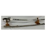 36-Inch German Officer’s Sword with Scabbard and Engraved Blade 36-Inch German Officer’s Sword with Scabbard and Engraved Blade