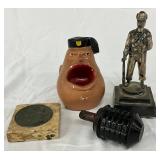 4 Military-Themed Decorative Items, Including Ceramic, Metal, and Marble Pieces 4 Military-Themed Decorative Items, Including Ceramic, Metal, and Marble Pieces