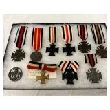 10 World War II German Medals with Ribbons and Insignia 10 World War II German Medals with Ribbons and Insignia