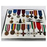 24 Italian WW2-Era Medals and Insignia 24 Italian WW2-Era Medals and Insignia