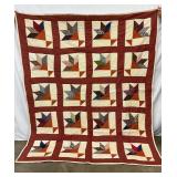 Handmade Patchwork Quilt with Leaf Motif and Red Border