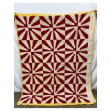 Early Hand-Stitched Quilt with Red and White Starburst Pattern