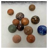 Early 1900s Clay, Glass, and Ceramic Marbles with Varied Colors