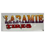 Emb. ‘Laramie Tires’ Metal Sign by Scioto Signs, 1995, 48×18in. 