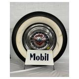 Mobil Tire Display with Dodge Hubcap
