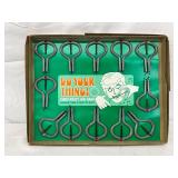 NOS Store Display of Chris-Kratt Jaw Harps with Illustrated Backing, 13in x 11in