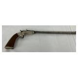 J. Stevens .22 Caliber Single-Shot Pistol with Nickel Plated Frame and Wooden Grip
