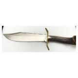 Remington Fixed-Blade Knife with Stag Handle and Brass Guard Remington Fixed-Blade Knife with Stag Handle and Brass Guard