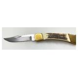 Buck 110 Folding Knife with Brass Bolsters and Stag Handle Buck 110 Folding Knife with Brass Bolsters and Stag Handle