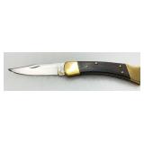 Buck Folding Knife with Brass Bolsters and Wooden Handle