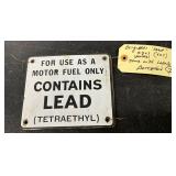 7 Porcelain Gasoline Signs with ‘Contains Lead (Tetraethyl)’ Text