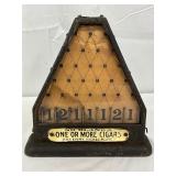 Early Metal Coin-Operated Cigar Game, 9×9 Inches