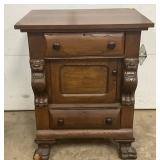 Early Carved Slot Machine Cabinet with Lion Head Motifs