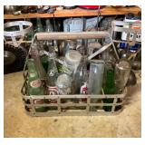 NUMEROUS BOTTLES AND CARRIERS