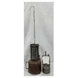 Two Vintage Metal Lanterns, Including a Kerosene Lantern and a Carbide Lantern