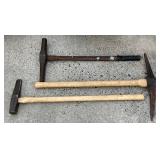 Three Hand Tools Including Two Pickaxes and One Sledgehammer