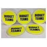 Five Circular Early Plastic ‘Budget Terms’ Signs, 15 in. Diameter