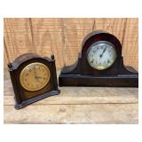 Two Wooden Mantel Clocks with Round Faces and Metal Accents