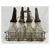 8 Emb. Early Glass Oil Bottles with Metal Spouts and Wire Rack
