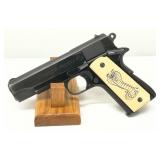 blued finish with custom grips engraved with a cobra design blued finish with custom grips engraved with a cobra design